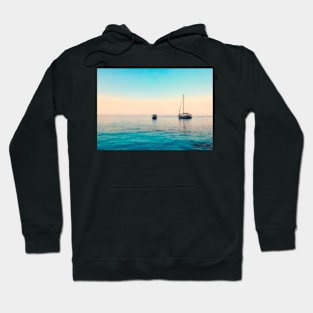 TWO BOATS AND A BLUE SUNSET ON THE SEA DESIGN Hoodie